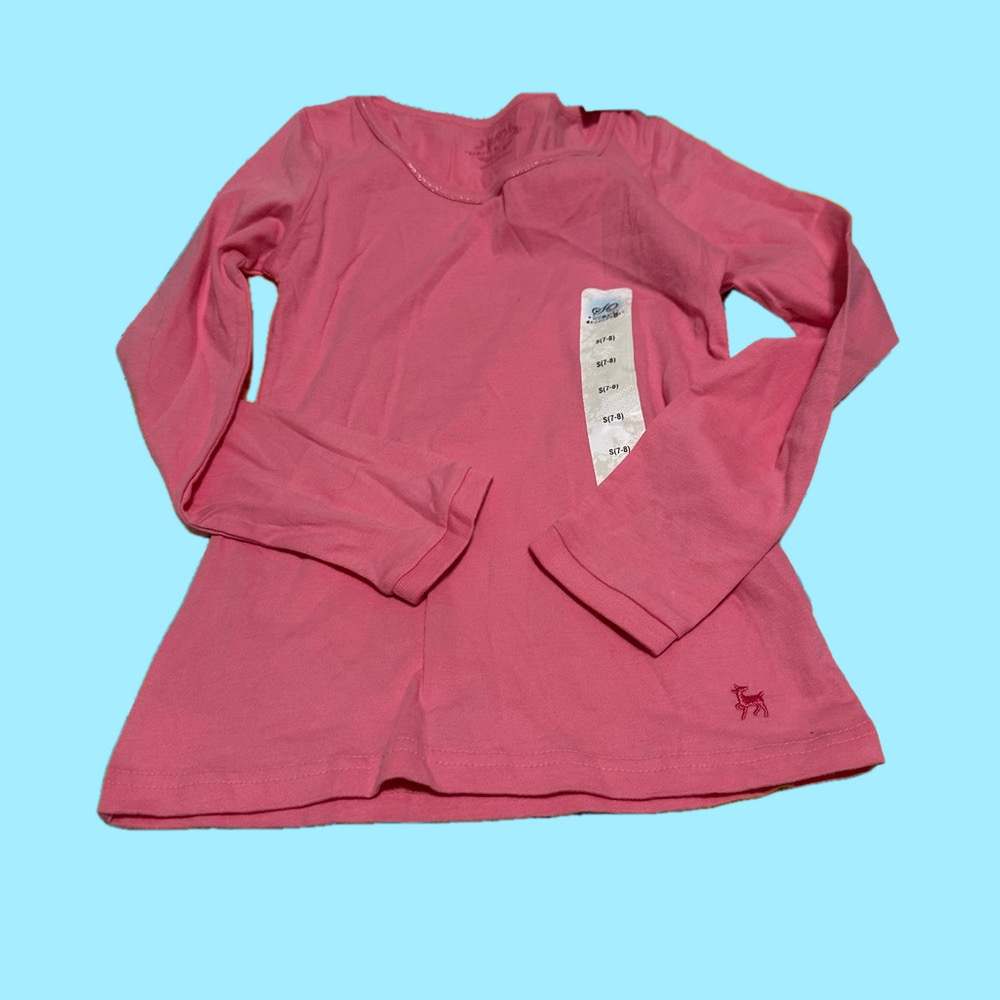 Girls pink long sleeved tee. Size 7-8, brand new!!